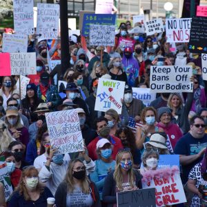 Womxn’s March Denver on the steps of the Colorado State Capitol.