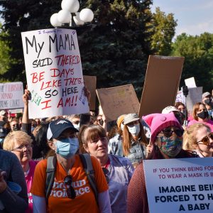 Womxn’s March Denver on the steps of the Colorado State Capitol.