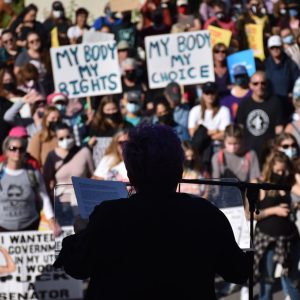 Our contract Organizer Gina Milan sharing her abortion story at the Womxn’s March Denver on the steps of the Colorado State Capitol.